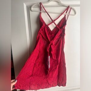Urban outfitters red dress with coral polka dots. Ajustable straps and back ties